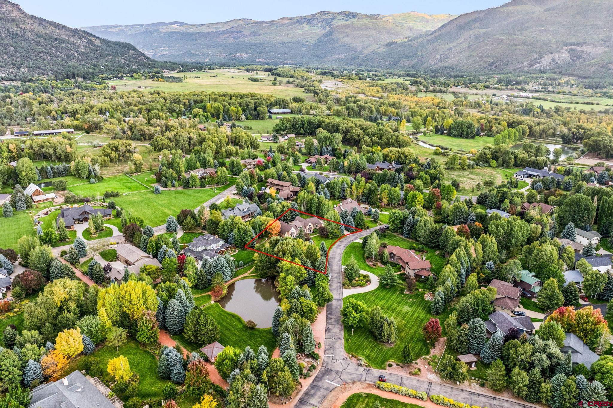 345 Red Rock Road Durango, CO 81301 - Photo 44 of 44 a view of a lush green field with lots of plants