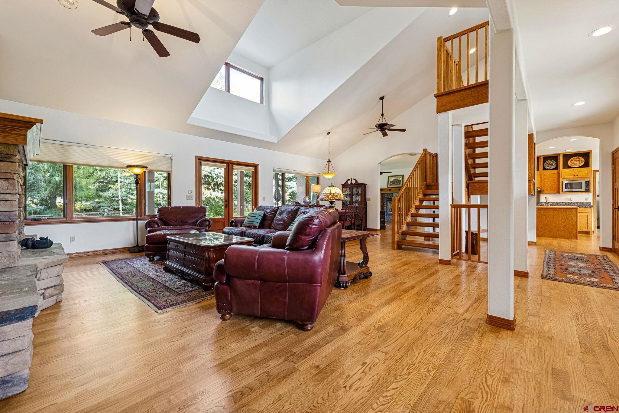 345 Red Rock Road Durango, CO 81301 - Photo 5 of 44 a living room with furniture and a large window