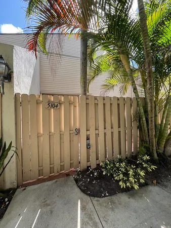 a view of a house with a garden