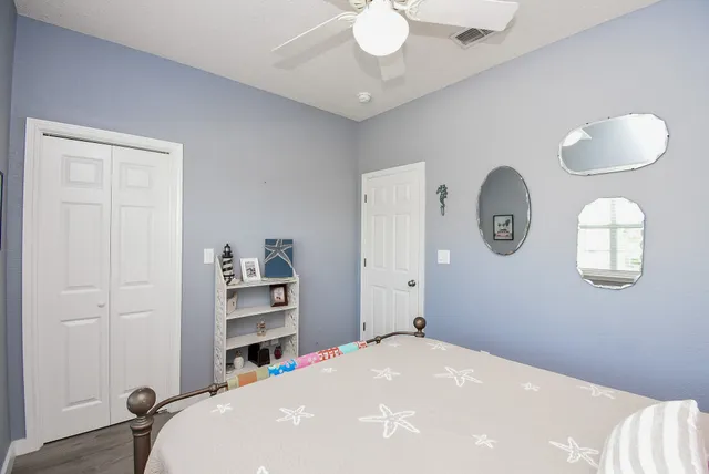 a view of chair and cabinet