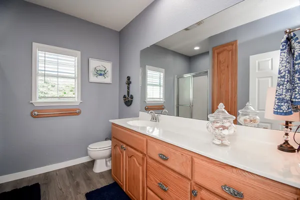 a kitchen with stainless steel appliances a sink and a refrigerator
