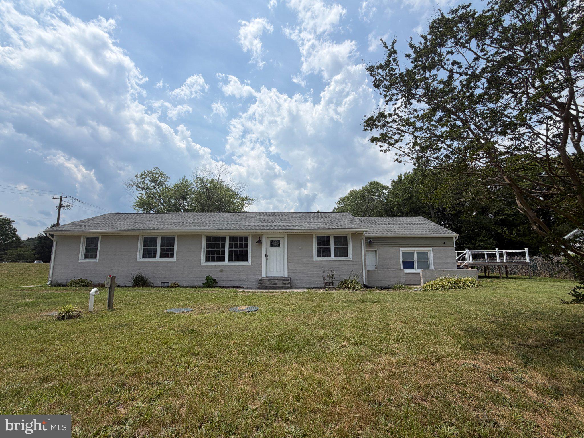 18658 Cool Spring Road Milton, DE 19968 - Photo 1 of 24 Charming home under a vast sky.