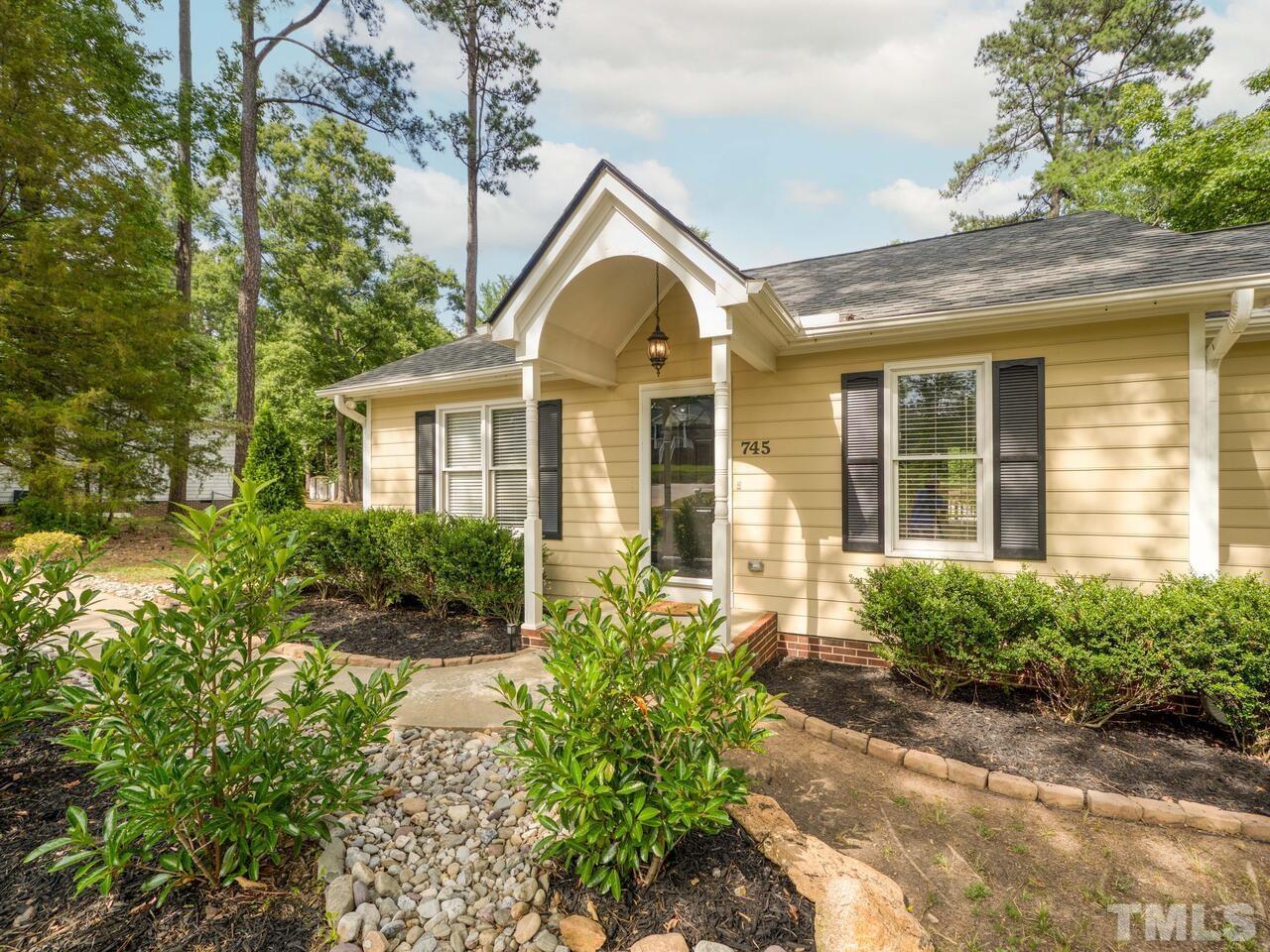 745 Brewer Circle Wake Forest, NC 27587 - Photo 1 of 43 front view of a house with a yard