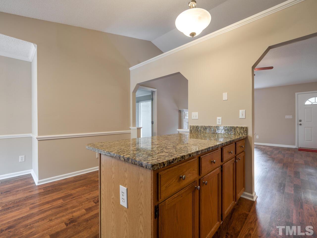 745 Brewer Circle Wake Forest, NC 27587 - Photo 15 of 43 a bathroom with a granite countertop sink and a mirror