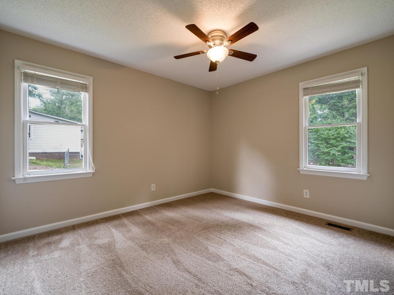 745 Brewer Circle Wake Forest, NC 27587 - Photo 19 of 43 an empty room with a window