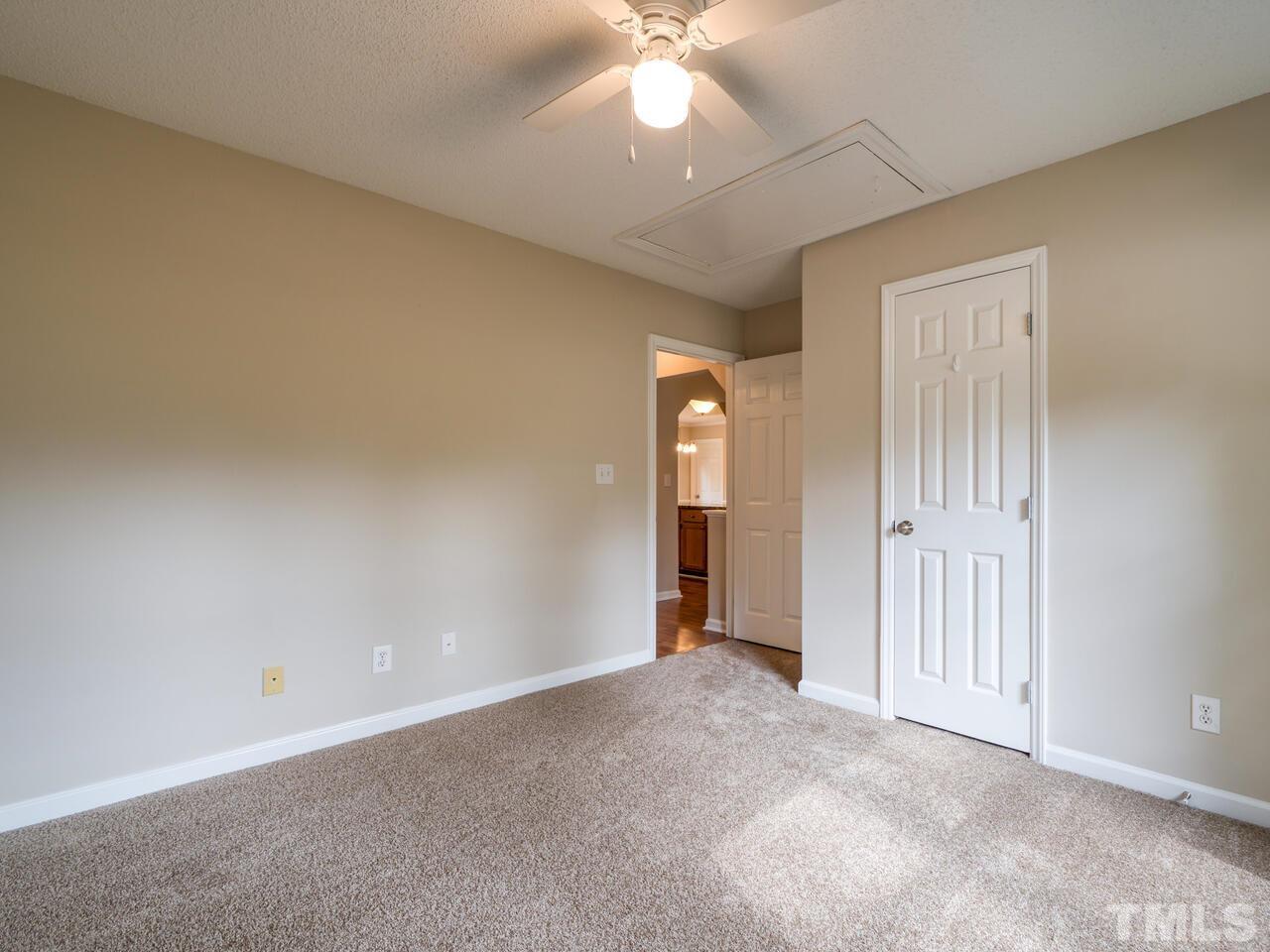 745 Brewer Circle Wake Forest, NC 27587 - Photo 26 of 43 an empty room with windows and fan