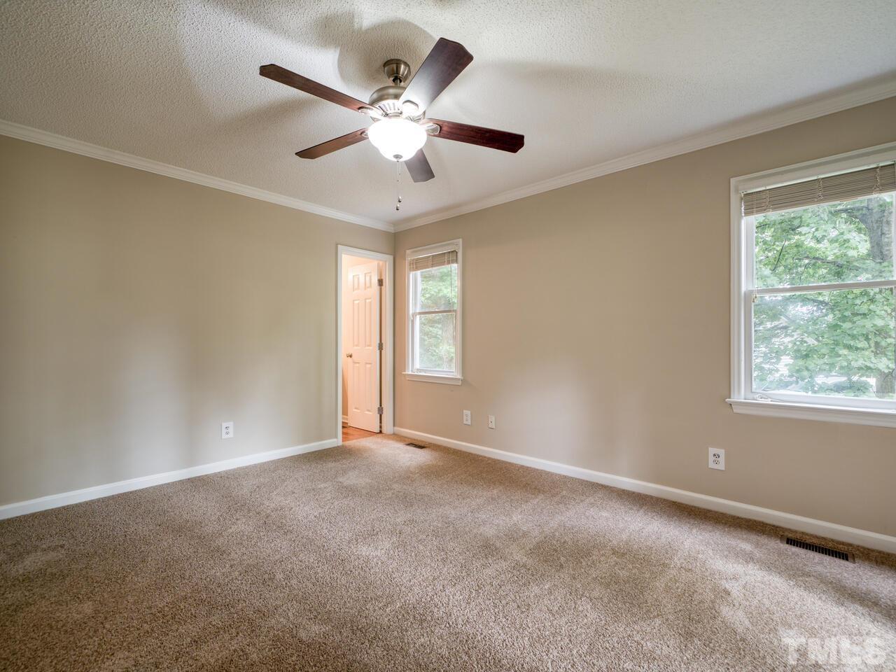 745 Brewer Circle Wake Forest, NC 27587 - Photo 28 of 43 a view of an empty room with a window
