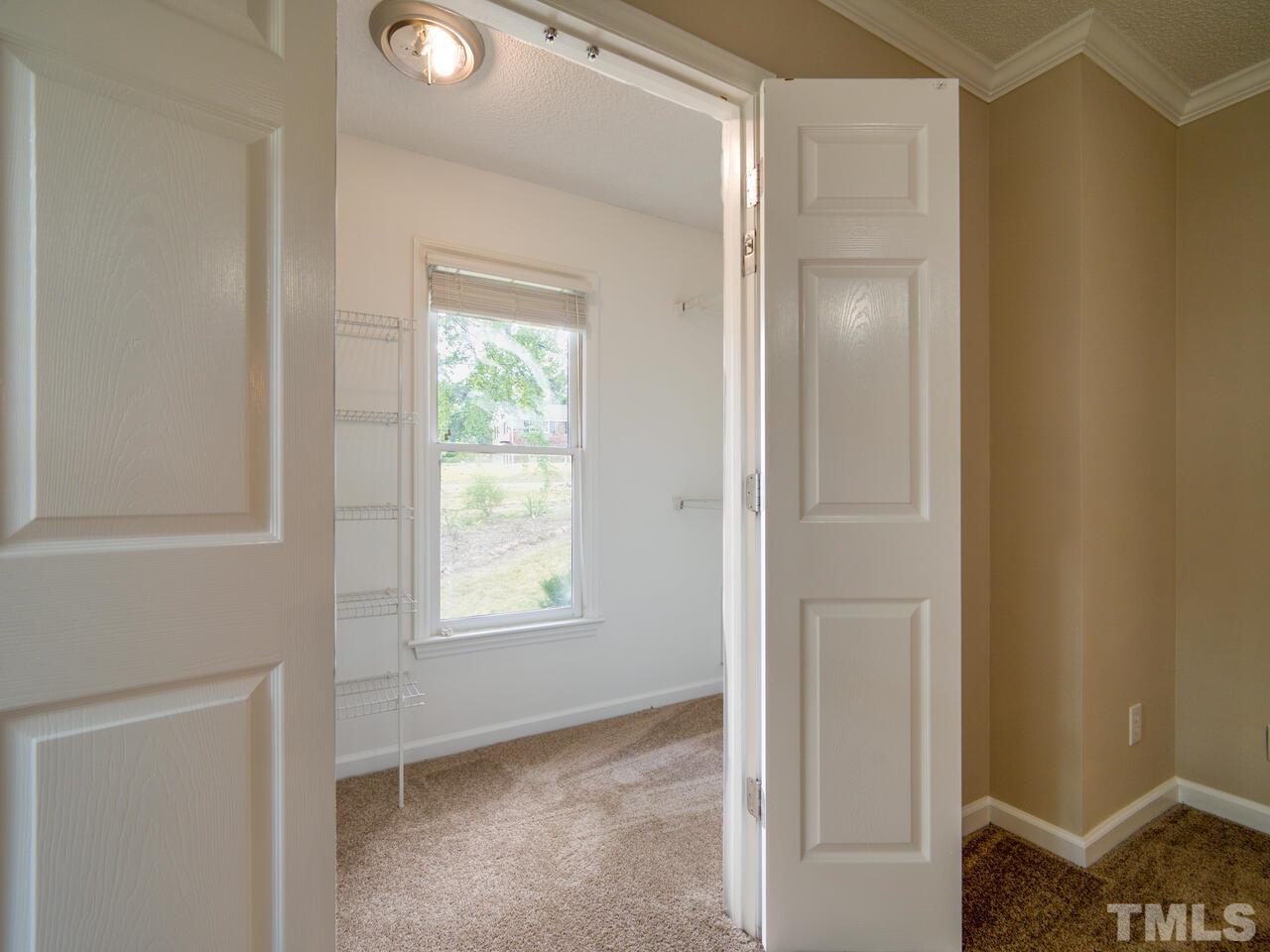 745 Brewer Circle Wake Forest, NC 27587 - Photo 30 of 43 a view of an empty room and window
