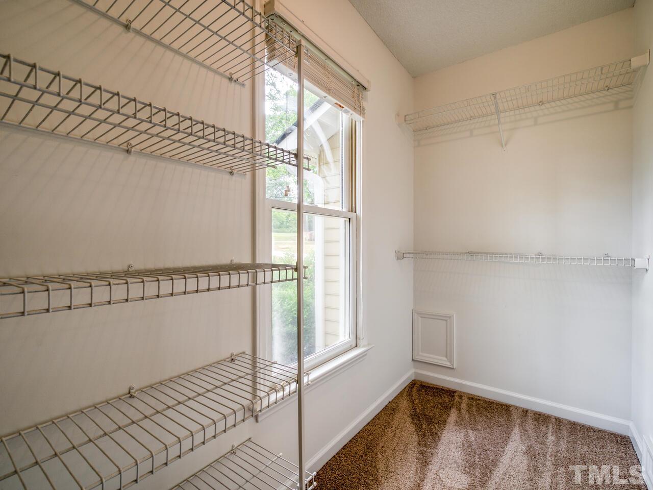745 Brewer Circle Wake Forest, NC 27587 - Photo 31 of 43 a view of empty room with wooden floor and fan