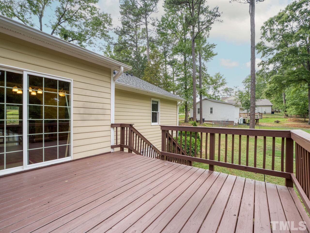 745 Brewer Circle Wake Forest, NC 27587 - Photo 34 of 43 a view of a house with a deck