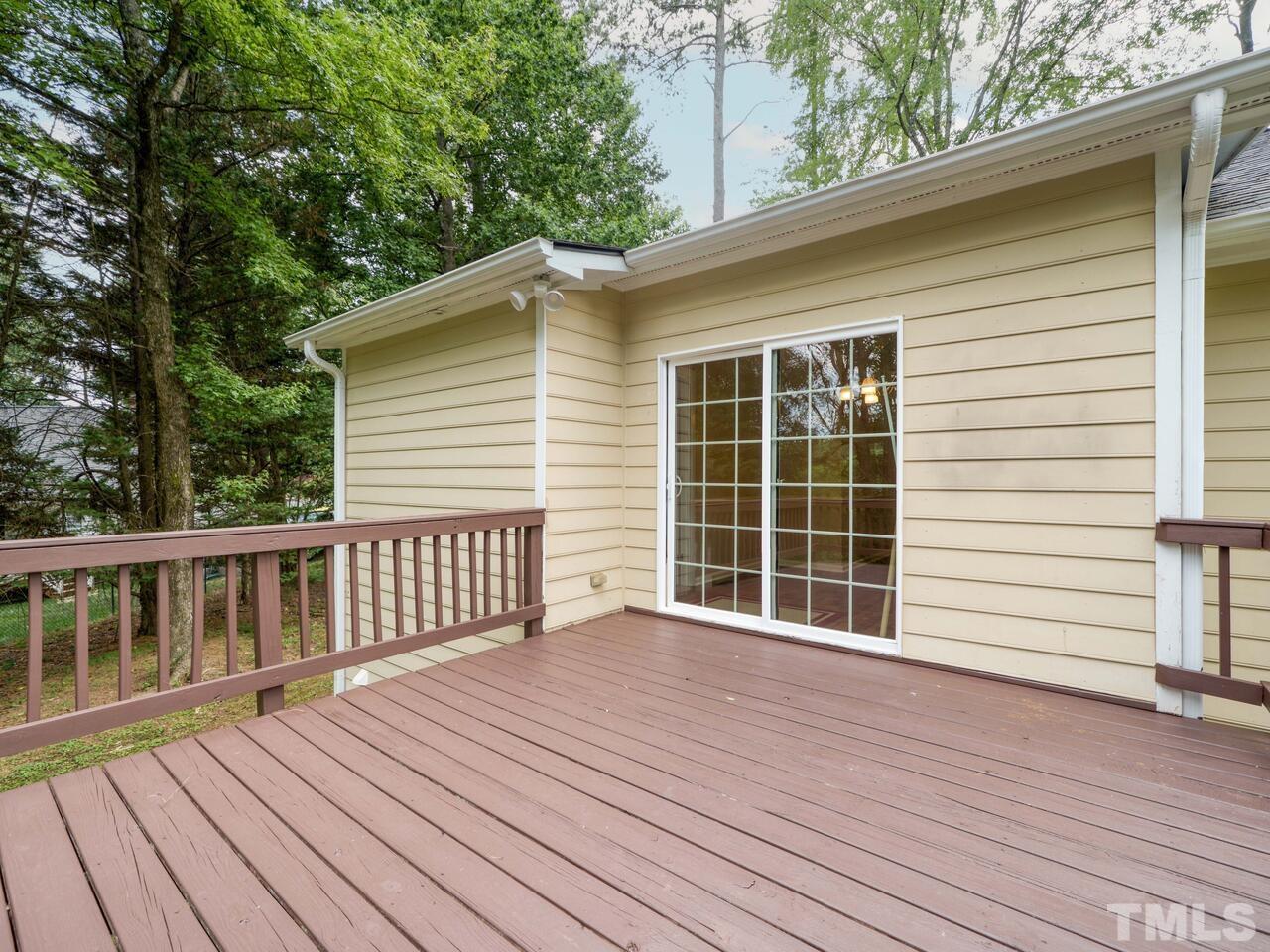 745 Brewer Circle Wake Forest, NC 27587 - Photo 35 of 43 a view of backyard with deck and wooden floor