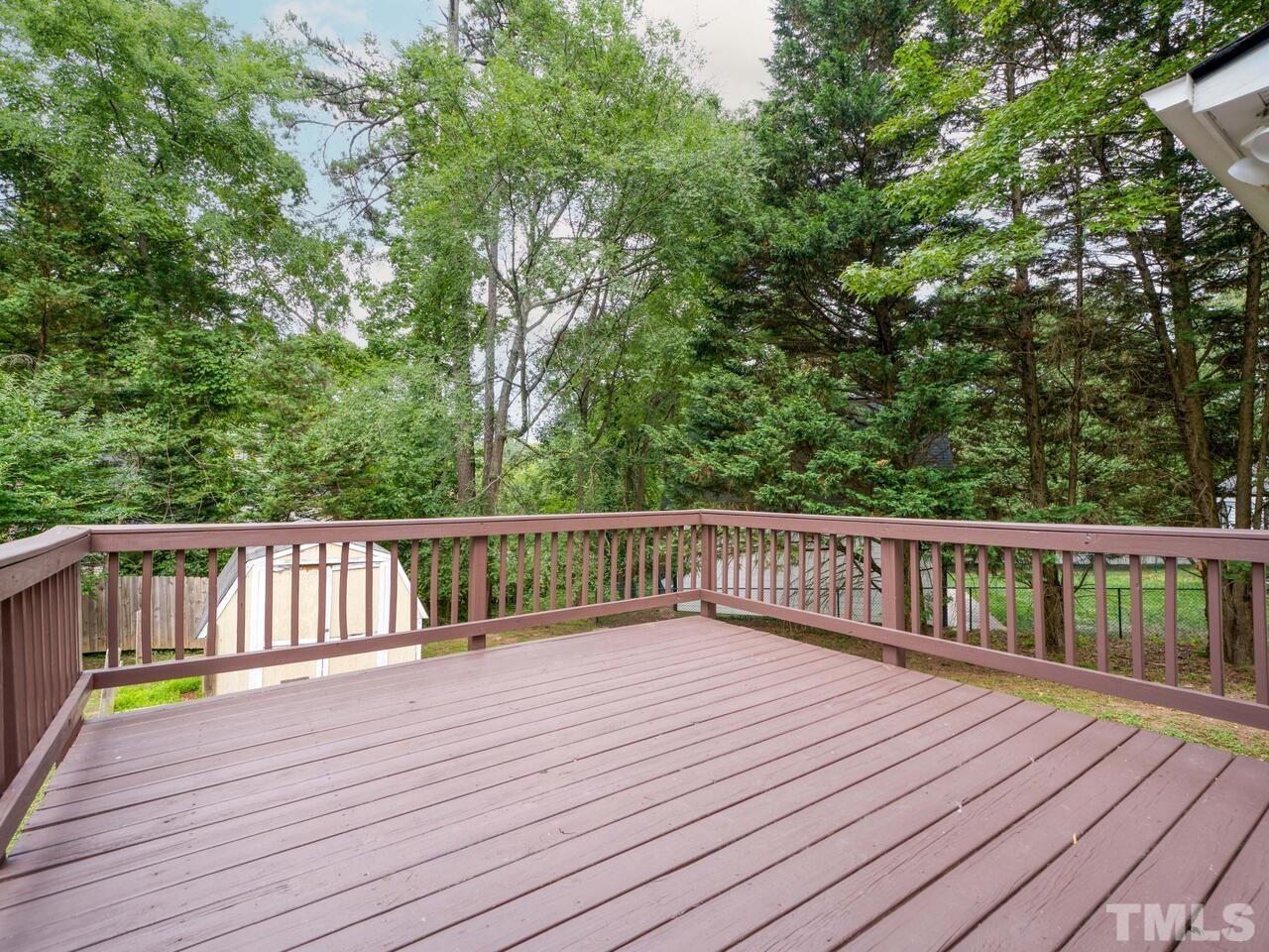 745 Brewer Circle Wake Forest, NC 27587 - Photo 36 of 43 a view of deck with a wooden floor and fence