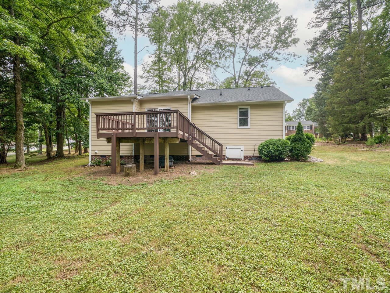 745 Brewer Circle Wake Forest, NC 27587 - Photo 38 of 43 a view of a house with a yard and sitting area