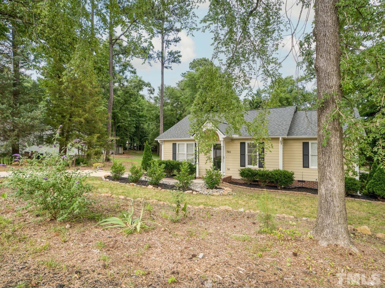 745 Brewer Circle Wake Forest, NC 27587 - Photo 43 of 43 a front view of a house with a yard