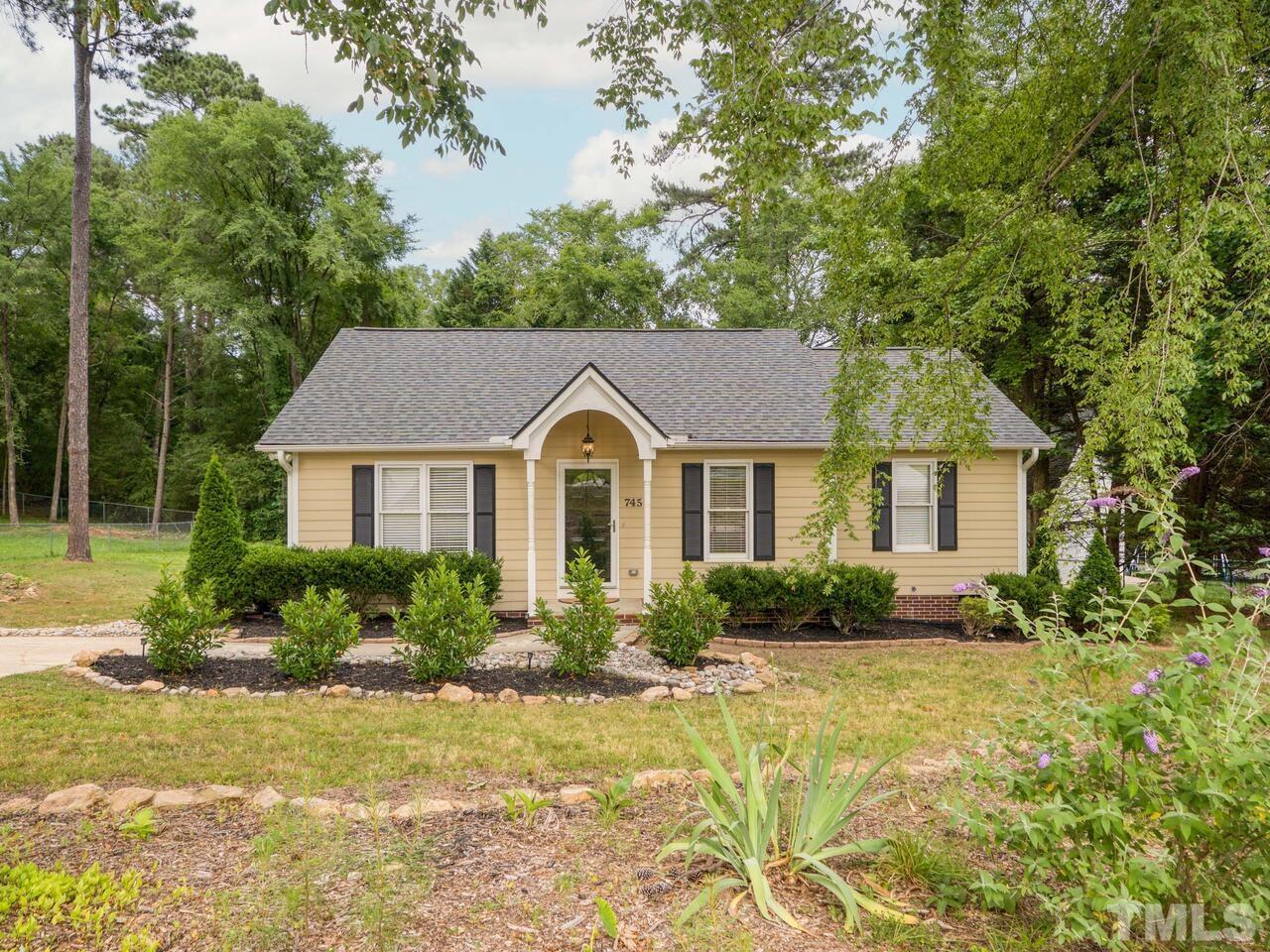 745 Brewer Circle Wake Forest, NC 27587 - Photo 7 of 43 a view of a house with garden