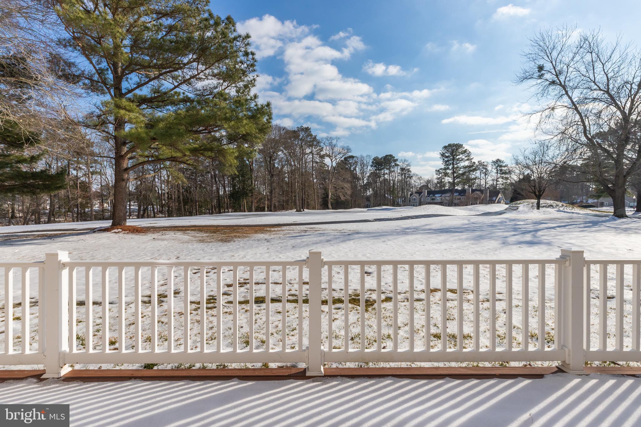 11602 Masters Lane, Unit 120 Berlin, MD 21811 - Photo 27 of 29 a view of a terrace with a yard
