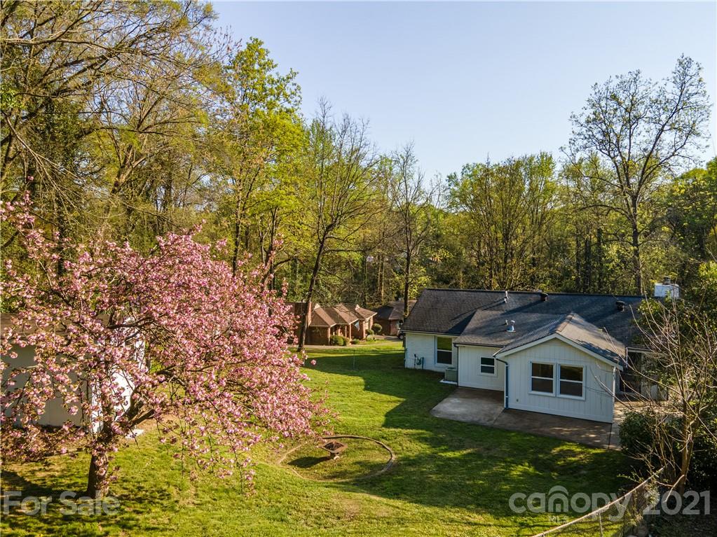 721 Rome Court Charlotte, NC 28209 - Photo 2 of 21 a front view of a house with a yard