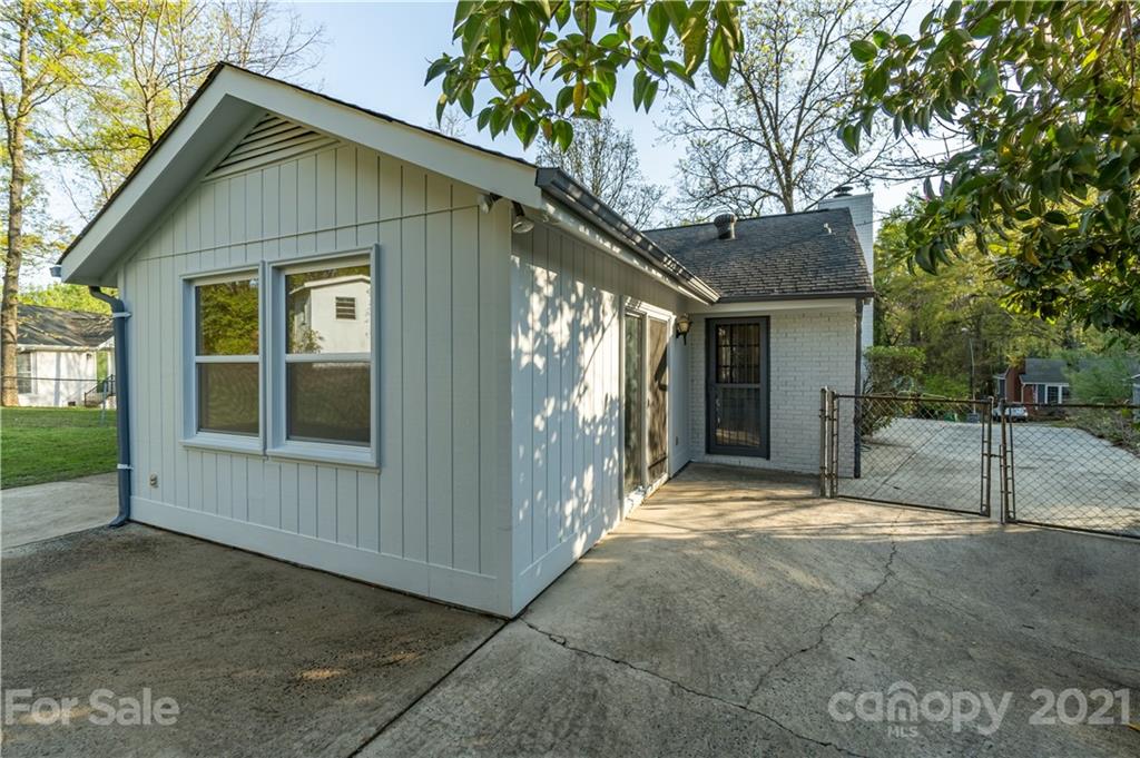 721 Rome Court Charlotte, NC 28209 - Photo 20 of 21 a view of backyard with large tree