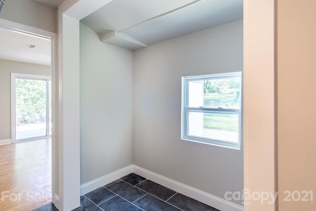 721 Rome Court Charlotte, NC 28209 - Photo 10 of 21 a view of an empty room and window