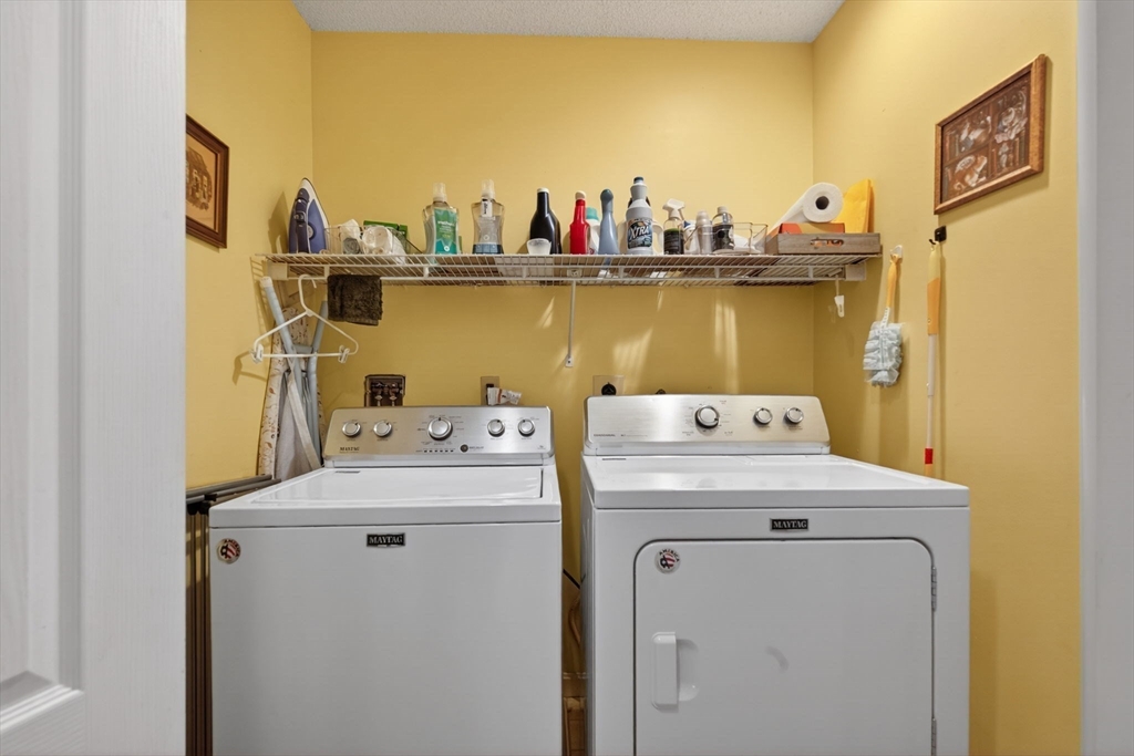 104 Johnson Road, Unit 1103 Chicopee, MA 01022 - Photo 21 of 42 a utility room with dryer and washer