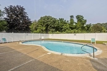 104 Johnson Road, Unit 1103 Chicopee, MA 01022 - Photo 3 of 42 a view of a outdoor space and swimming pool