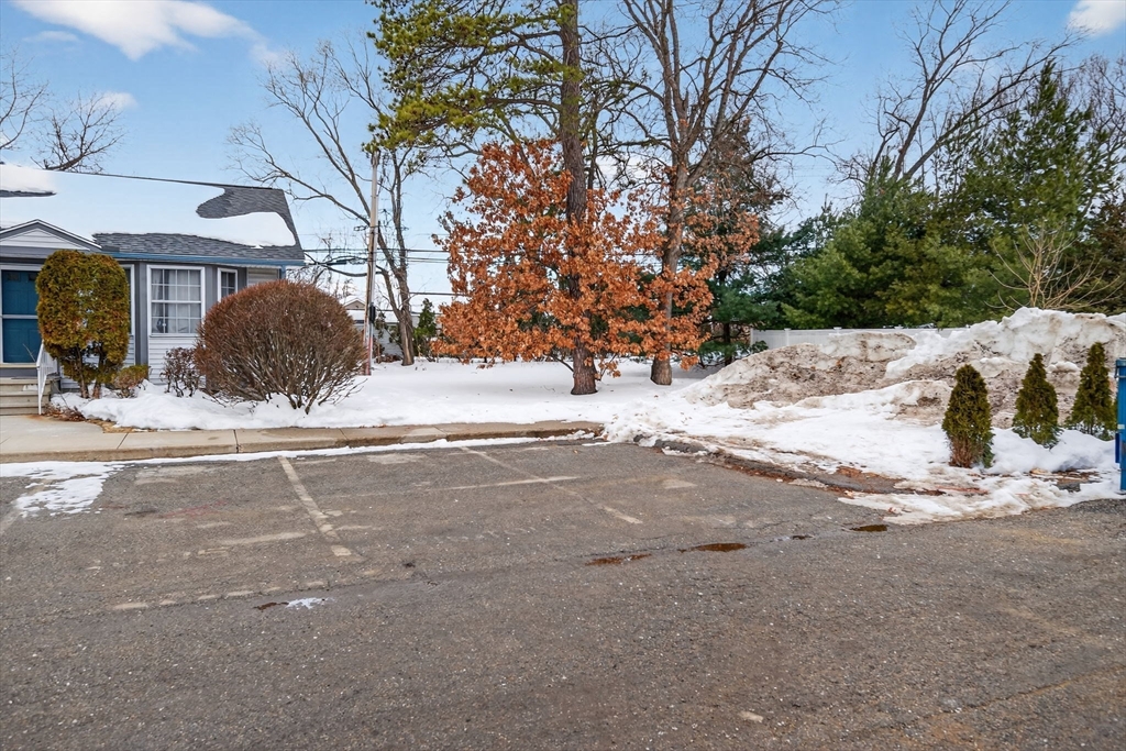 104 Johnson Road, Unit 1103 Chicopee, MA 01022 - Photo 37 of 42 a view of a road with a yard