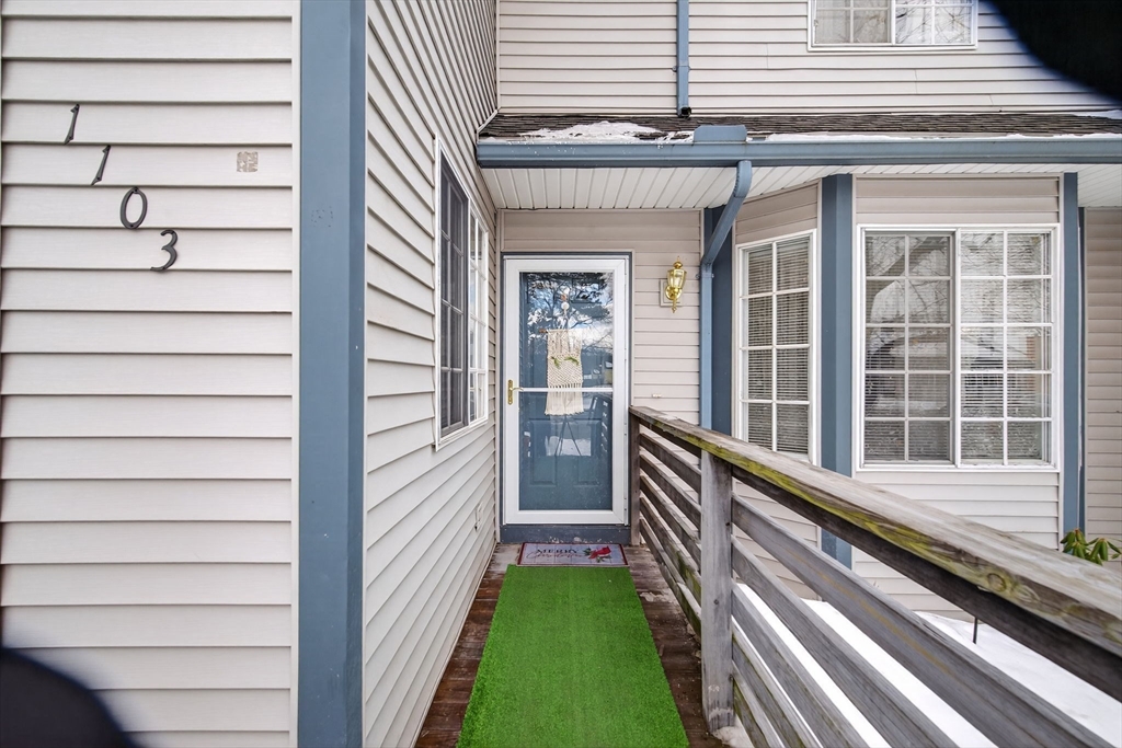104 Johnson Road, Unit 1103 Chicopee, MA 01022 - Photo 39 of 42 a view of a balcony with a floor to ceiling window and stairs