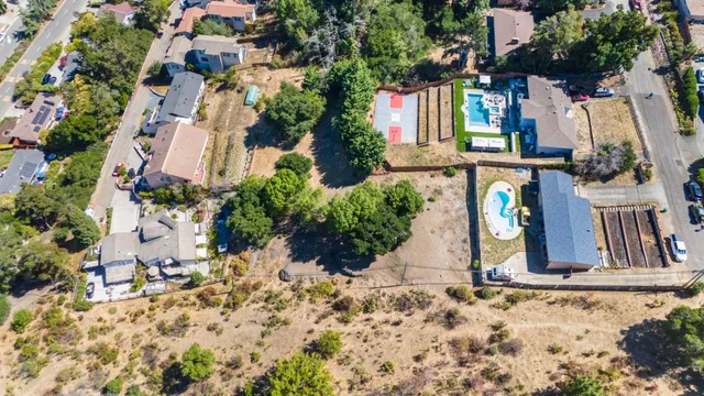 a view of a backyard of the house