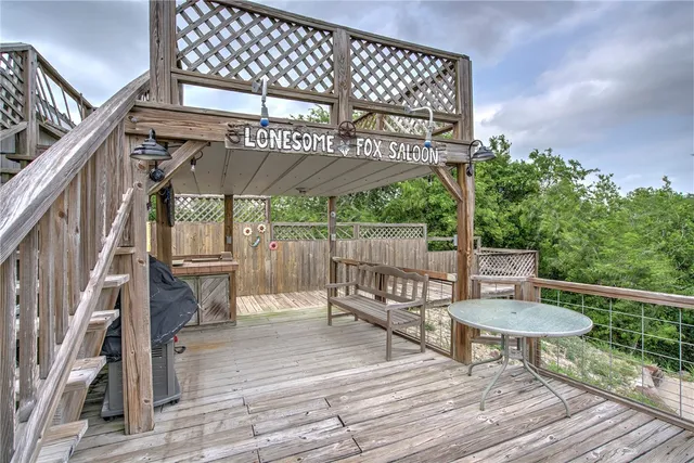 a view of a chairs and table on the wooden floor