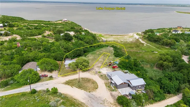 an aerial view of a house with a garden