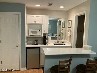 3030 Marsh Winds Circle, Unit 604B Southport, NC 28461 - Photo 2 of 7 Kitchenette