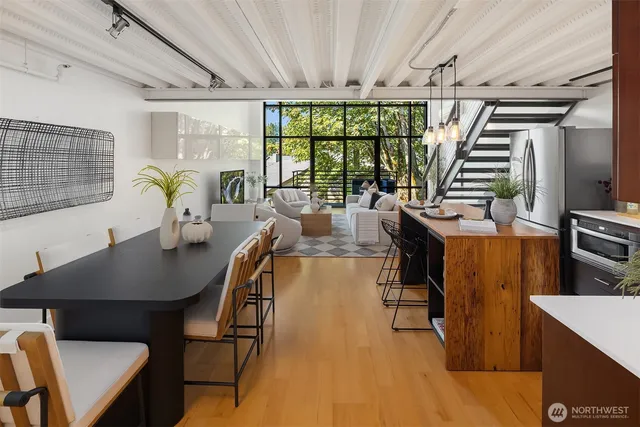 a view of a dining room with furniture window and outside view