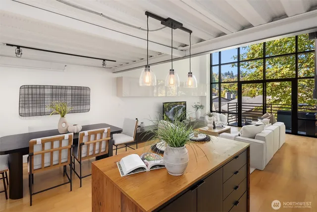 a view of a dining room with furniture window and outside view