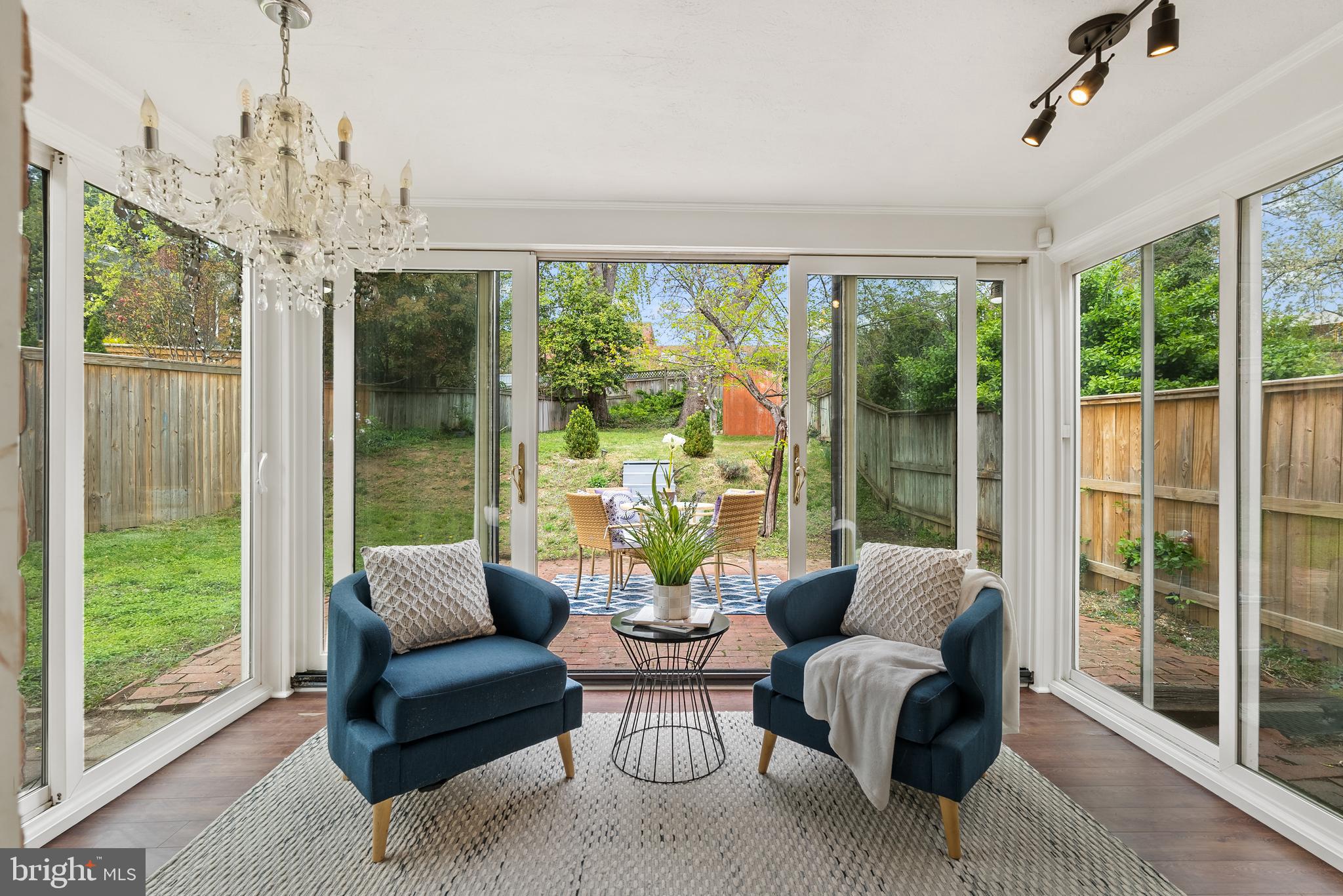 4521 Clark Place Northwest Washington, DC 20007 - Photo 11 of 27 a living room with furniture and a chandelier