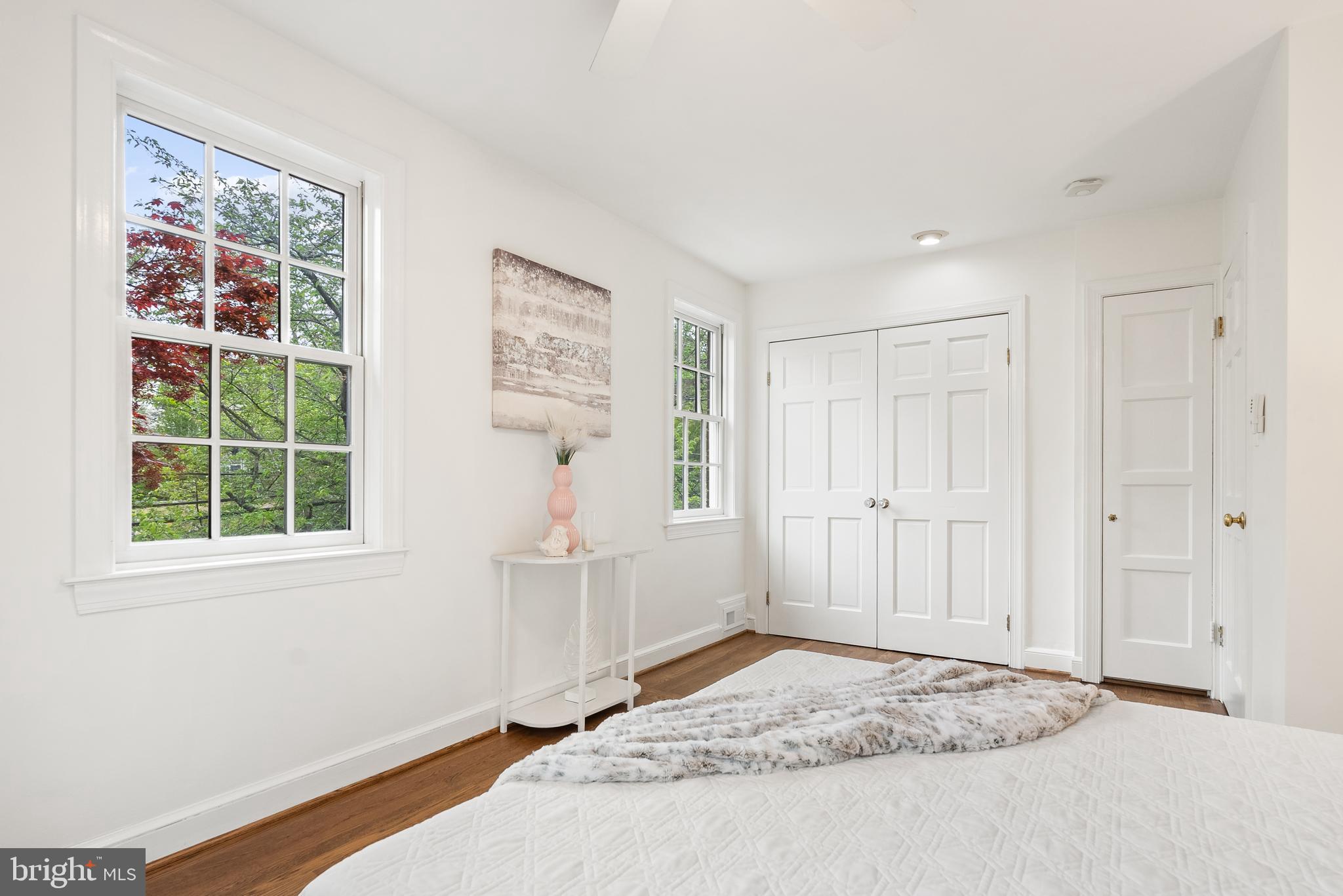 4521 Clark Place Northwest Washington, DC 20007 - Photo 15 of 27 a view of a livingroom with wooden floor and windows