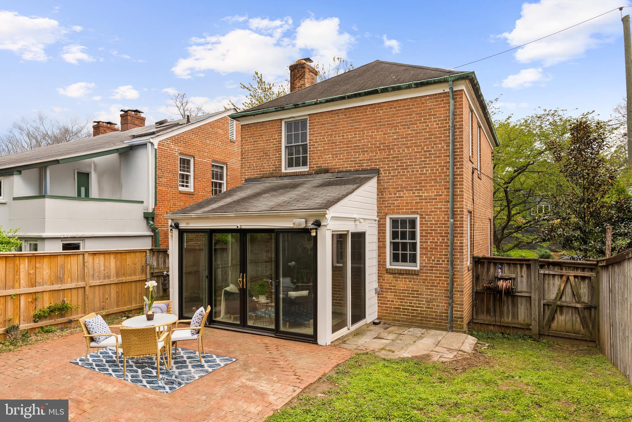 4521 Clark Place Northwest Washington, DC 20007 - Photo 21 of 27 a view of a house with backyard porch and sitting area