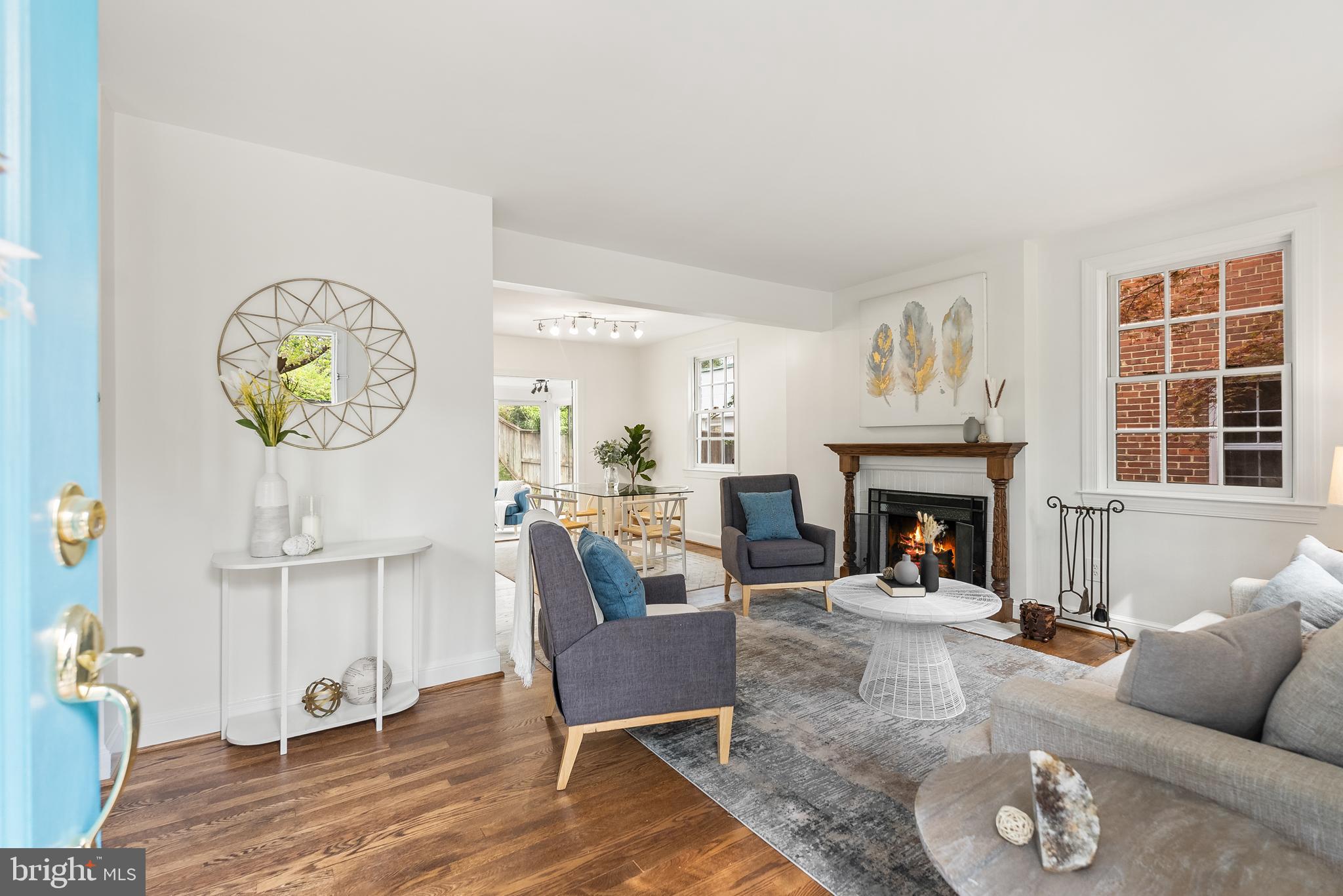 4521 Clark Place Northwest Washington, DC 20007 - Photo 4 of 27 a living room with furniture and a fireplace