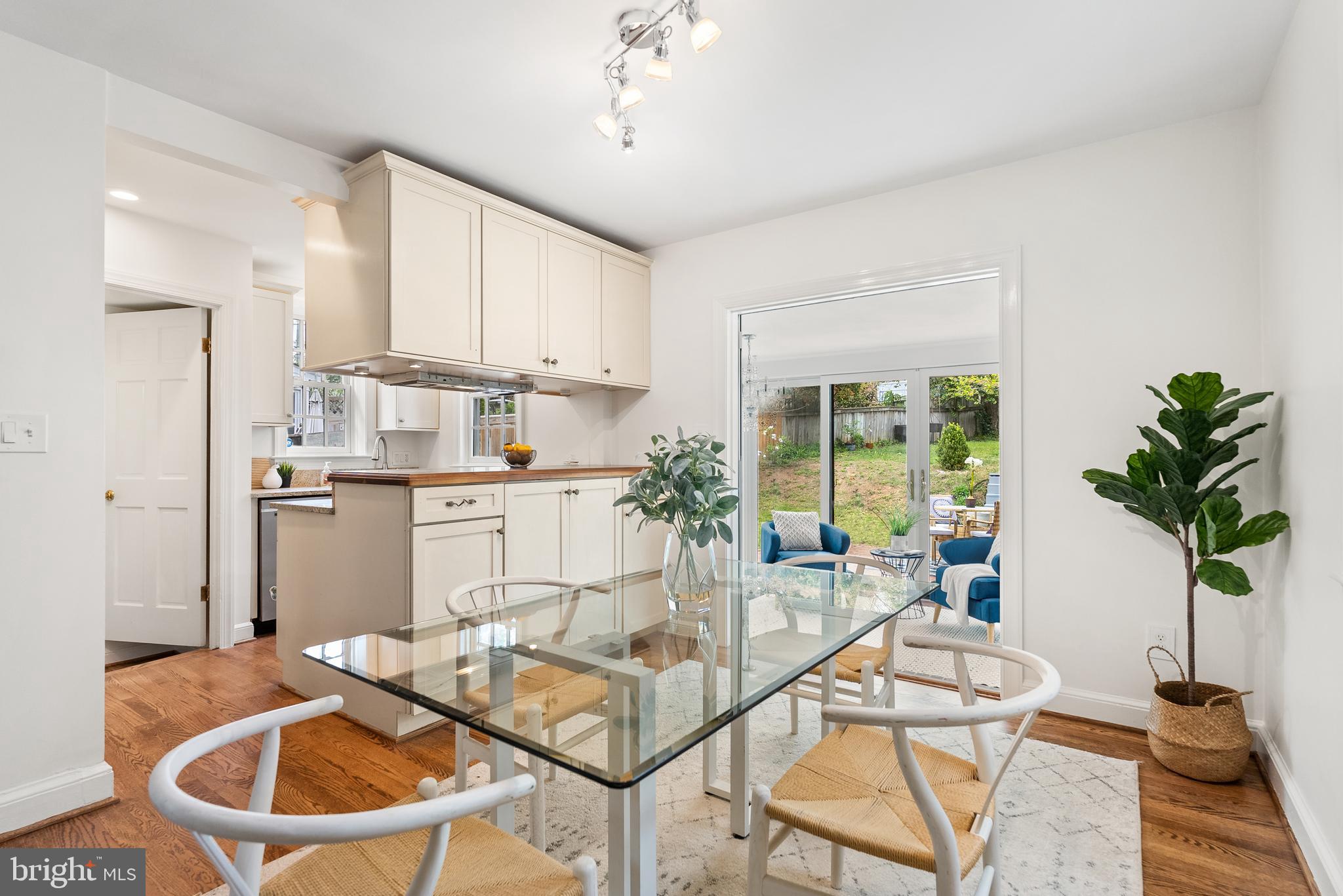 4521 Clark Place Northwest Washington, DC 20007 - Photo 6 of 27 a view of a dining room with furniture window and wooden floor