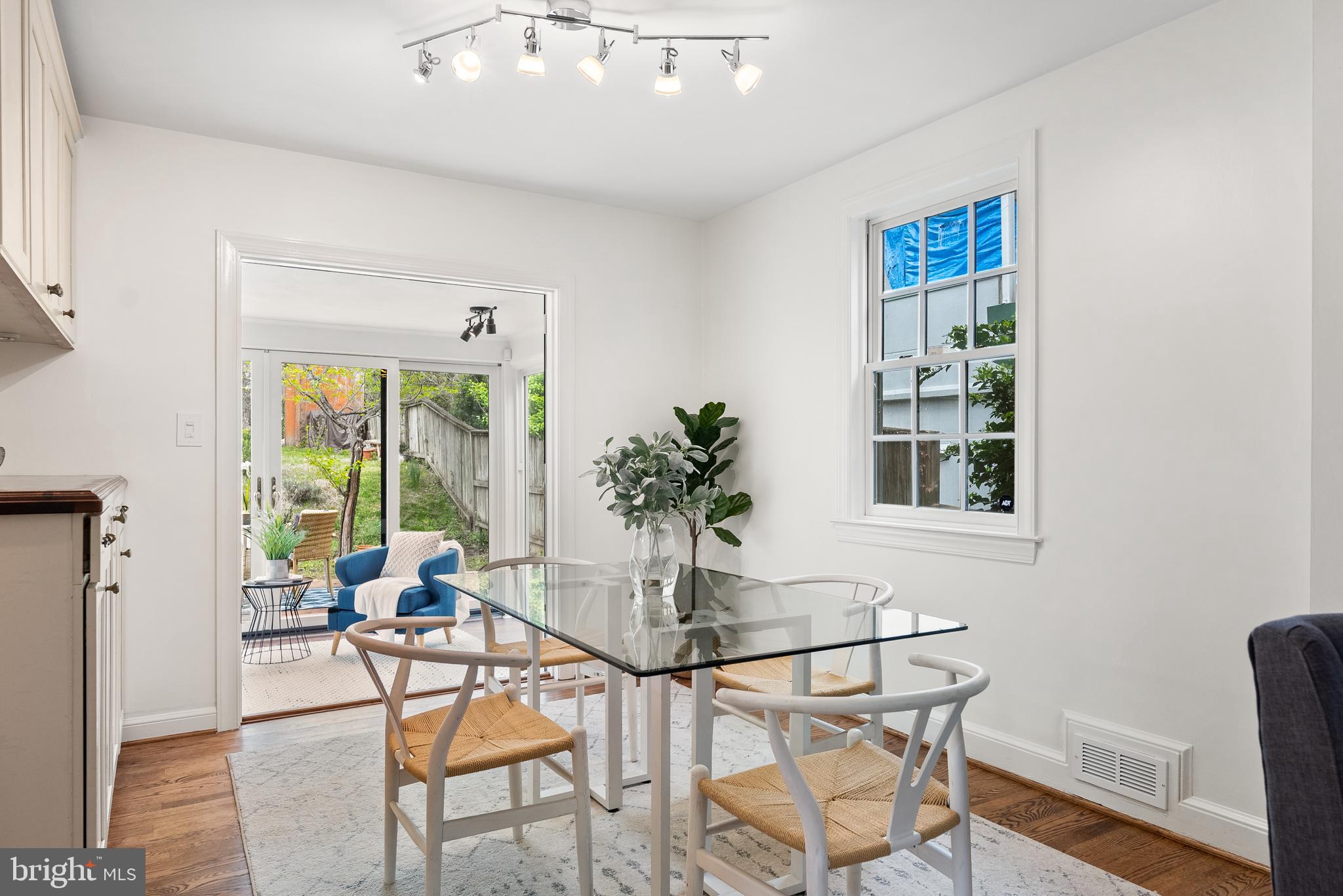 4521 Clark Place Northwest Washington, DC 20007 - Photo 10 of 27 a dining room with furniture and window