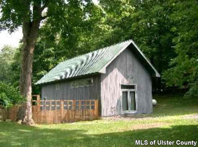 660 Vly Road Stone Ridge, NY 12484 - Photo 5 of 5 a view of a backyard with a tub