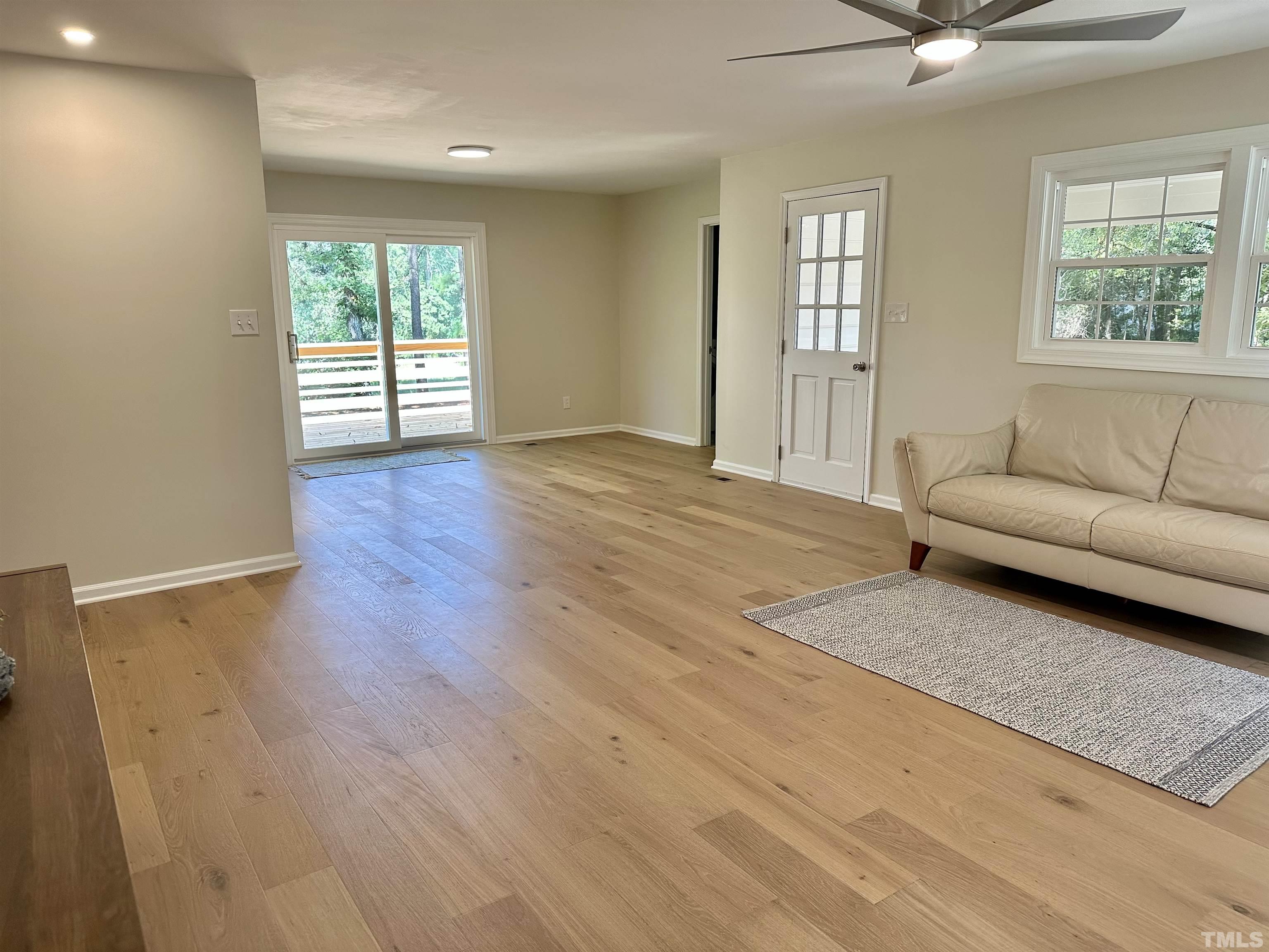 8904 Ransdell Road Raleigh, NC 27603 - Photo 12 of 23 a living room with furniture and a window
