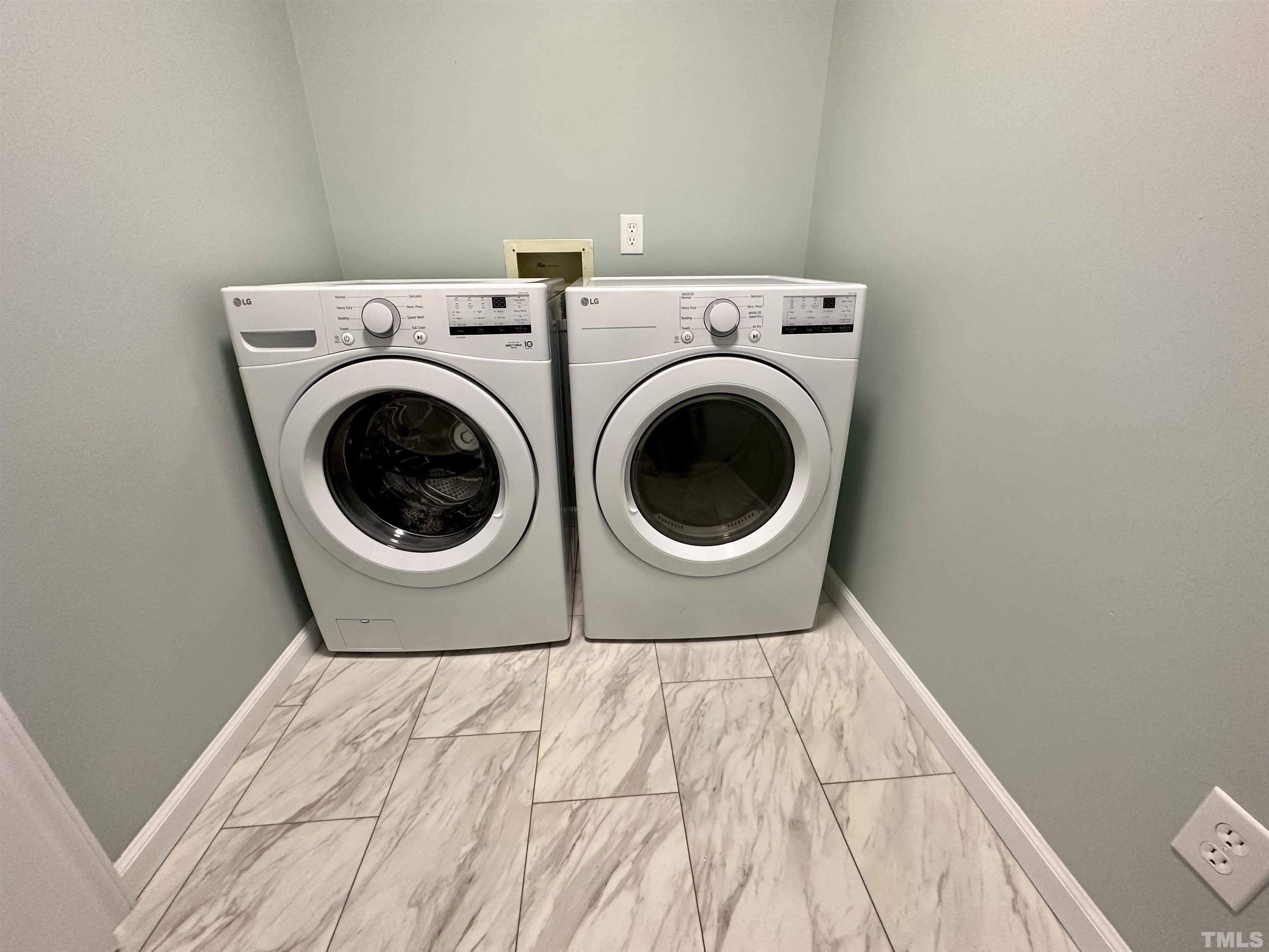 8904 Ransdell Road Raleigh, NC 27603 - Photo 23 of 23 a bedroom with a bed and utility room