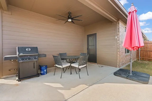 a view of a workspace with furniture