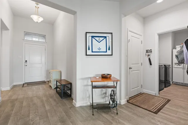 a view of a livingroom with workspace and a couch