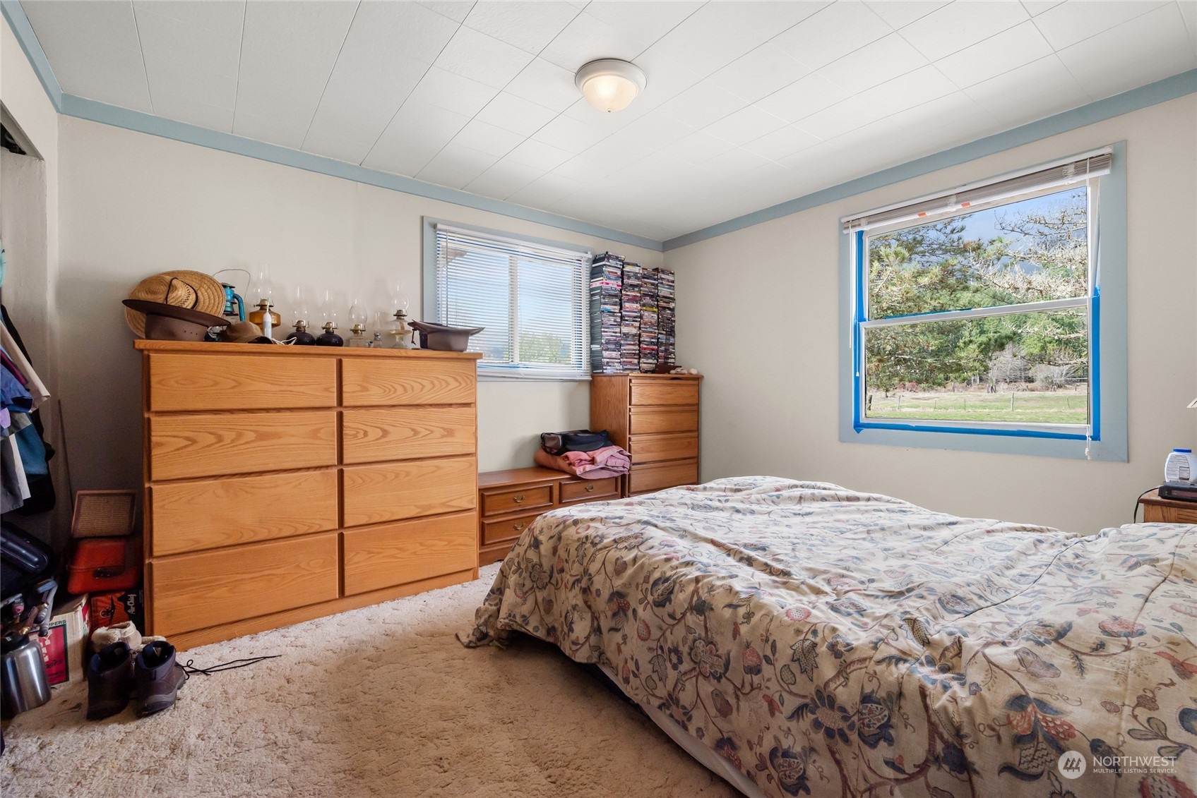 36621 Swede Heaven Road Arlington, WA 98223 - Photo 12 of 19 a bedroom with a bed and a window