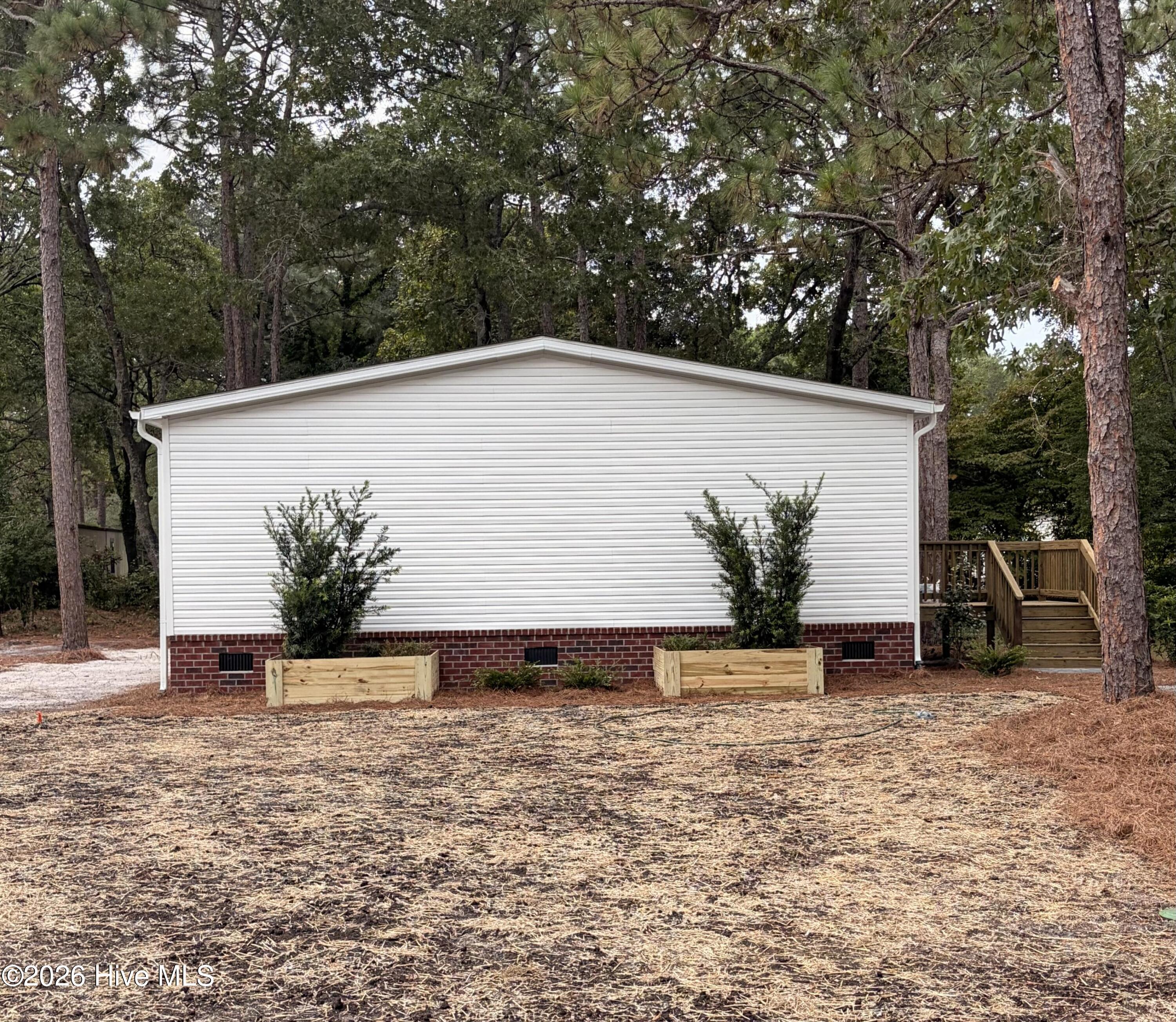 209 Sycamore Road Southport, NC 28461 - Photo 4 of 40 04_beyc6ac16121f2a05