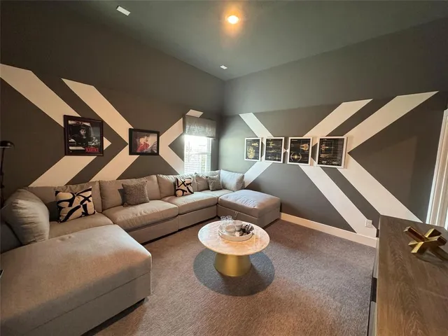 a bedroom with bed and window