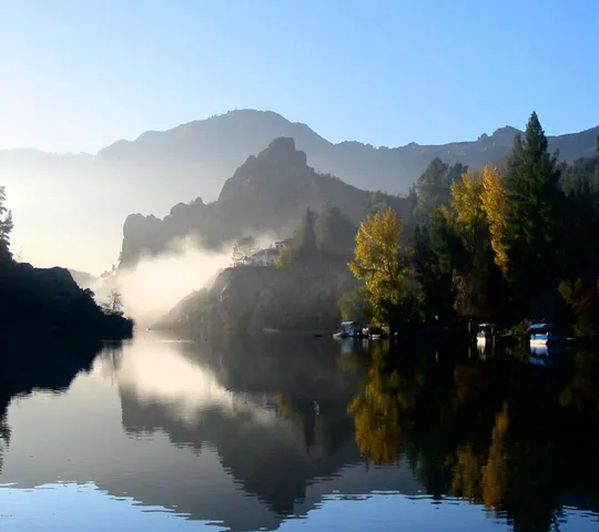 a view of a swimming pool with an outdoor seating