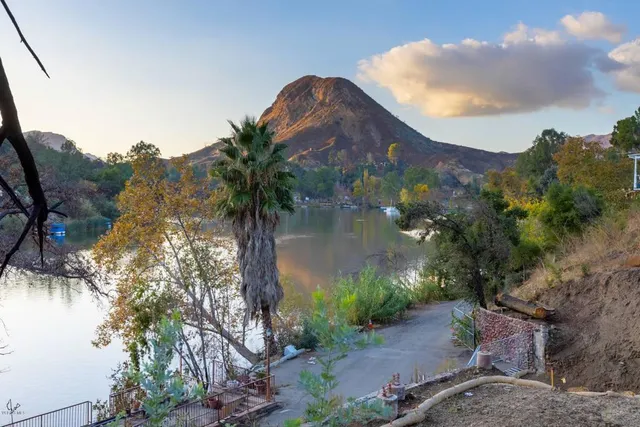 a view of a lake with a mountain in the background