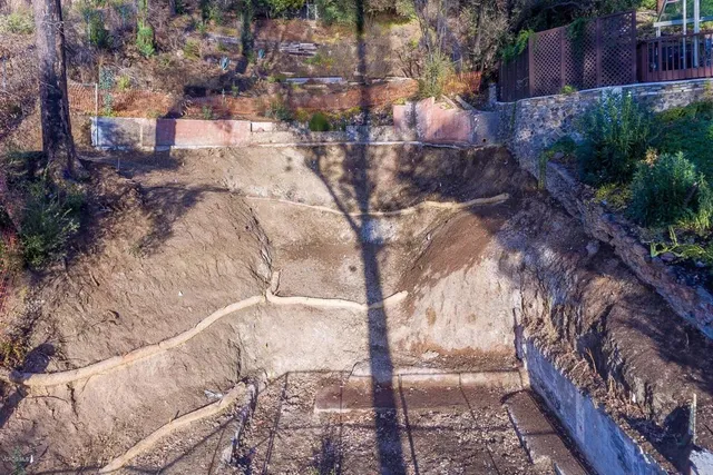 a backyard of a house with lots of green space